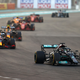 Lewis Hamilton of Great Britain driving the (44) Mercedes AMG Petronas F1 Team Mercedes W12 leads Max Verstappen of the Netherlands driving the (33) Red Bull Racing RB16B Honda during the F1 Grand Prix of Abu Dhabi at Yas Marina Circuit on December 12, 2021 in Abu Dhabi, United Arab Emirates.